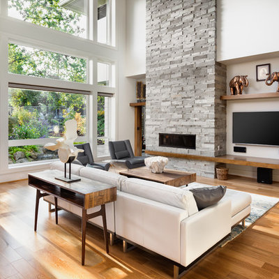 Living room - huge contemporary formal and open concept light wood floor living room idea in Portland with white walls, a stone fireplace, a wall-mounted tv and a ribbon fireplace