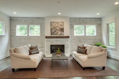Large transitional formal and open concept dark wood floor living room photo in Nashville with white walls, a standard fireplace and a tile fireplace