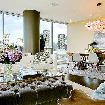 Example of a trendy open concept dark wood floor living room design in Seattle with beige walls