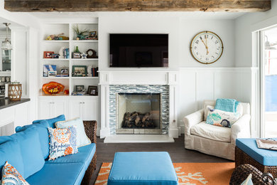 Example of a transitional living room design in Orange County with white walls and a wall-mounted tv