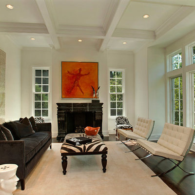Inspiration for a contemporary living room remodel in Chicago with white walls and a standard fireplace
