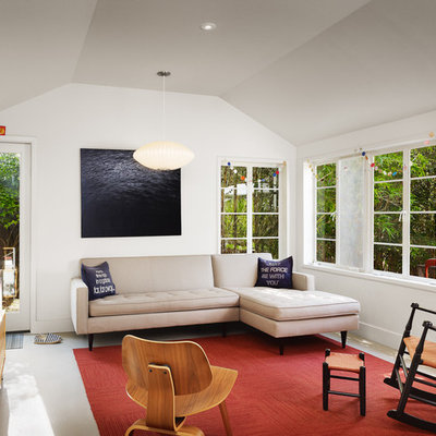 Minimalist concrete floor living room photo in Austin