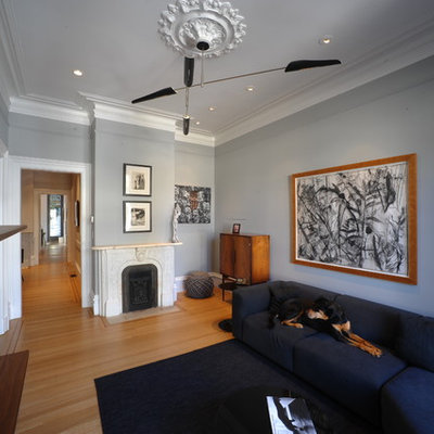 Example of a trendy living room design in San Francisco with gray walls