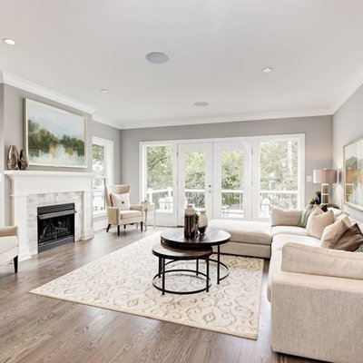 Example of a transitional formal dark wood floor and brown floor living room design in DC Metro with gray walls, a standard fireplace, a tile fireplace and no tv