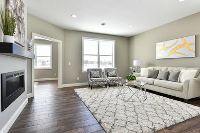 Brown floor living room photo in Minneapolis with gray walls