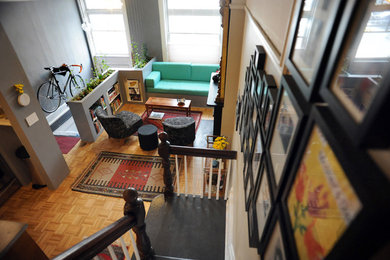 Small trendy orange floor living room photo in Boston