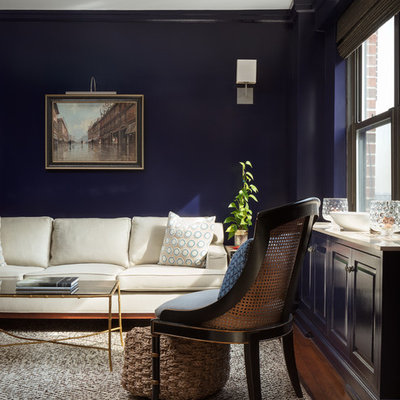 Large elegant formal and enclosed medium tone wood floor and brown floor living room photo in New York with blue walls, no fireplace and no tv