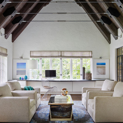 Inspiration for a farmhouse dark wood floor living room remodel in Chicago with white walls
