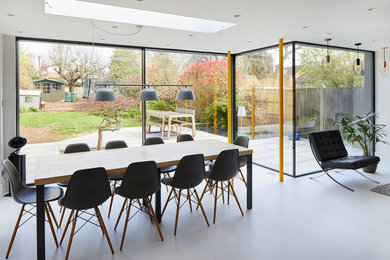 Medium sized contemporary dining room in Hertfordshire.