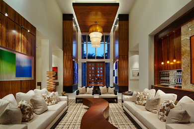 Inspiration for a huge contemporary open concept living room remodel in Miami with white walls, no fireplace and no tv