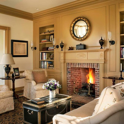 Country formal and enclosed living room photo in New York with a standard fireplace, a brick fireplace, no tv and yellow walls