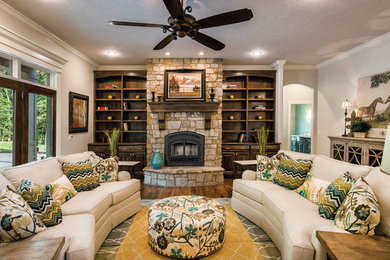 Mid-sized elegant formal and enclosed dark wood floor living room photo in Other with gray walls, a standard fireplace, a stone fireplace and no tv