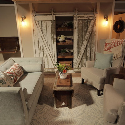 Inspiration for a small country open concept light wood floor living room remodel in Other