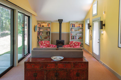 Small asian open concept carpeted living room photo in Boston with a wood stove and a tile fireplace