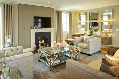 Photo of a large contemporary enclosed living room in Essex with a music area, grey walls, light hardwood flooring, a standard fireplace, a concrete fireplace surround and a wall mounted tv.