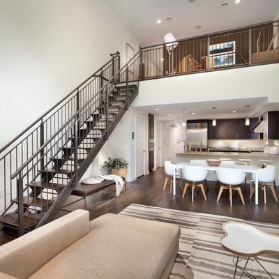 Inspiration for a contemporary open concept dark wood floor living room remodel in DC Metro with white walls