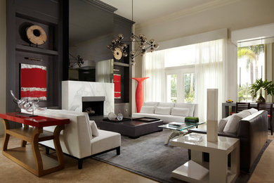 Foto di un grande soggiorno design con pareti nere, pavimento in cemento e camino classico