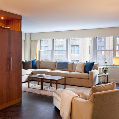Living room - mid-sized transitional formal and enclosed dark wood floor living room idea in New York with beige walls, no fireplace and no tv
