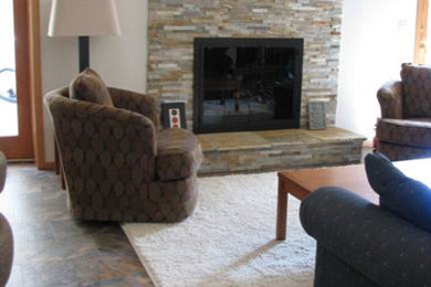 Example of a trendy living room design in Detroit