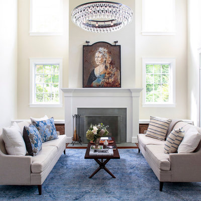 Living room - large traditional formal and open concept dark wood floor and brown floor living room idea in New York with beige walls, a standard fireplace, a stone fireplace and no tv