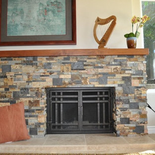 Mid-sized arts and crafts formal limestone floor and beige floor living room photo in Orange County with beige walls, a standard fireplace, a stone fireplace and no tv