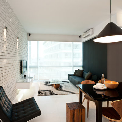Inspiration for a modern white floor living room remodel in Singapore with no fireplace, a wall-mounted tv and multicolored walls