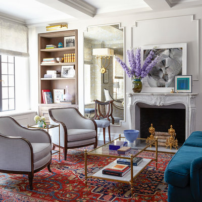Inspiration for a mid-sized timeless open concept dark wood floor and brown floor living room remodel in New York with a bar, gray walls, a standard fireplace, a stone fireplace and no tv