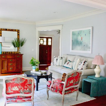 Aqua and Pops of Red in a Layered Living Room
