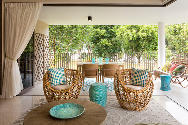 Tropical Living Room by Interior Design Journey Pte Ltd