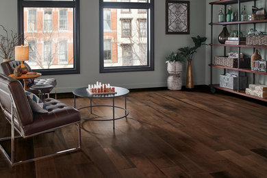 Example of a classic dark wood floor and brown floor living room design in Other