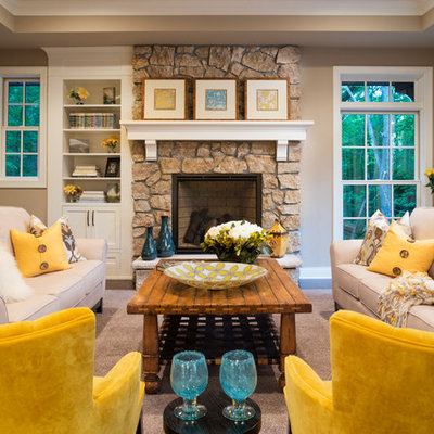 Inspiration for a mid-sized timeless formal and open concept carpeted and beige floor living room remodel in Minneapolis with beige walls, a standard fireplace, a stone fireplace and no tv