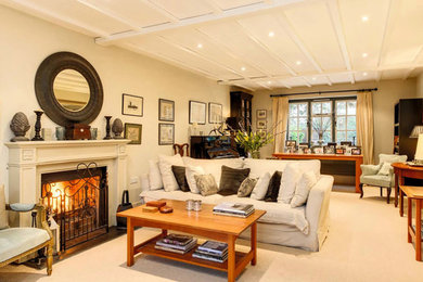 Design ideas for a traditional living room in Sussex.