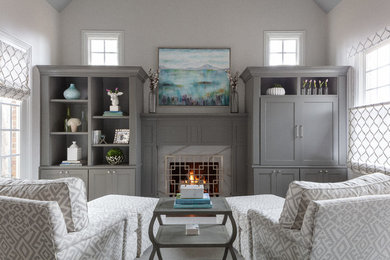 Inspiration for a small contemporary open concept living room library remodel in Charlotte with beige walls, a standard fireplace, a stone fireplace and no tv