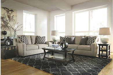 Example of a transitional living room design in Other