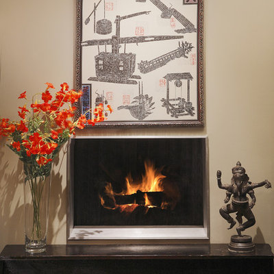 Inspiration for a living room remodel in Phoenix with beige walls and a standard fireplace