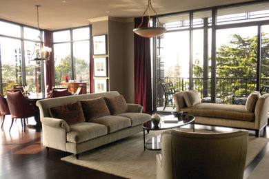 Example of a large classic formal and open concept dark wood floor living room design in Atlanta with beige walls, no fireplace and no tv