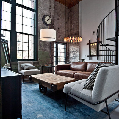 Mid-sized urban open concept concrete floor and gray floor living room photo in Atlanta with white walls, no fireplace and a tv stand