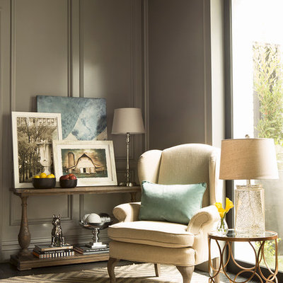 Example of a transitional living room design in Los Angeles with gray walls
