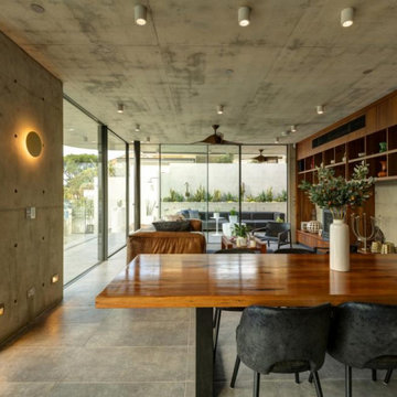 industrial modern living room with concrete walls