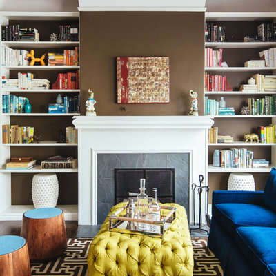 Mid-sized trendy living room library photo in San Francisco with brown walls, a standard fireplace and a stone fireplace