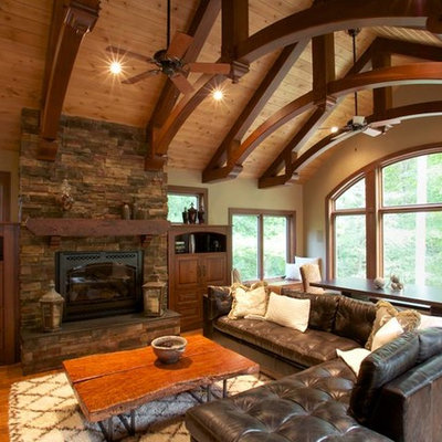 Living room - large rustic formal and open concept medium tone wood floor and beige floor living room idea in Other with beige walls, a standard fireplace, a stone fireplace and no tv