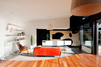 Modern living room in Melbourne with white walls.