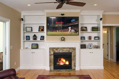 Example of a transitional living room design in Providence