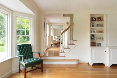 Photo of a traditional living room in Providence with medium hardwood flooring.