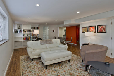 Mid-sized trendy open concept vinyl floor living room photo in DC Metro
