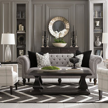 Bassett Gray Tufted Sofa and plaid chairs