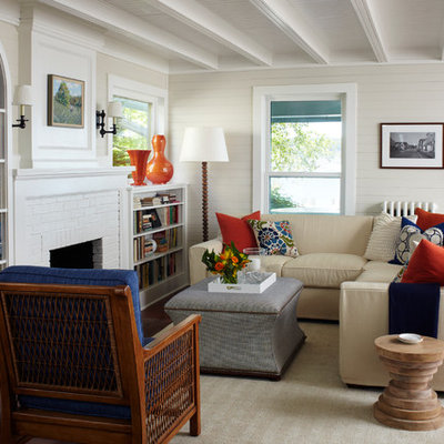 Elegant living room photo in Chicago with beige walls, a standard fireplace and no tv