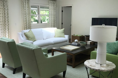 Example of a beach style living room design in Charleston