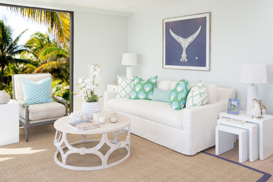 Inspiration for a coastal medium tone wood floor living room remodel in San Diego with gray walls
