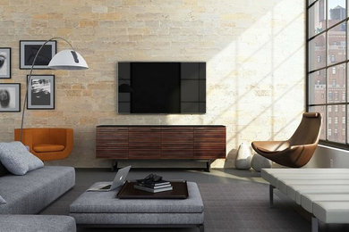 Example of a mid-sized trendy concrete floor living room design in San Diego with beige walls, no fireplace, a brick fireplace and a tv stand